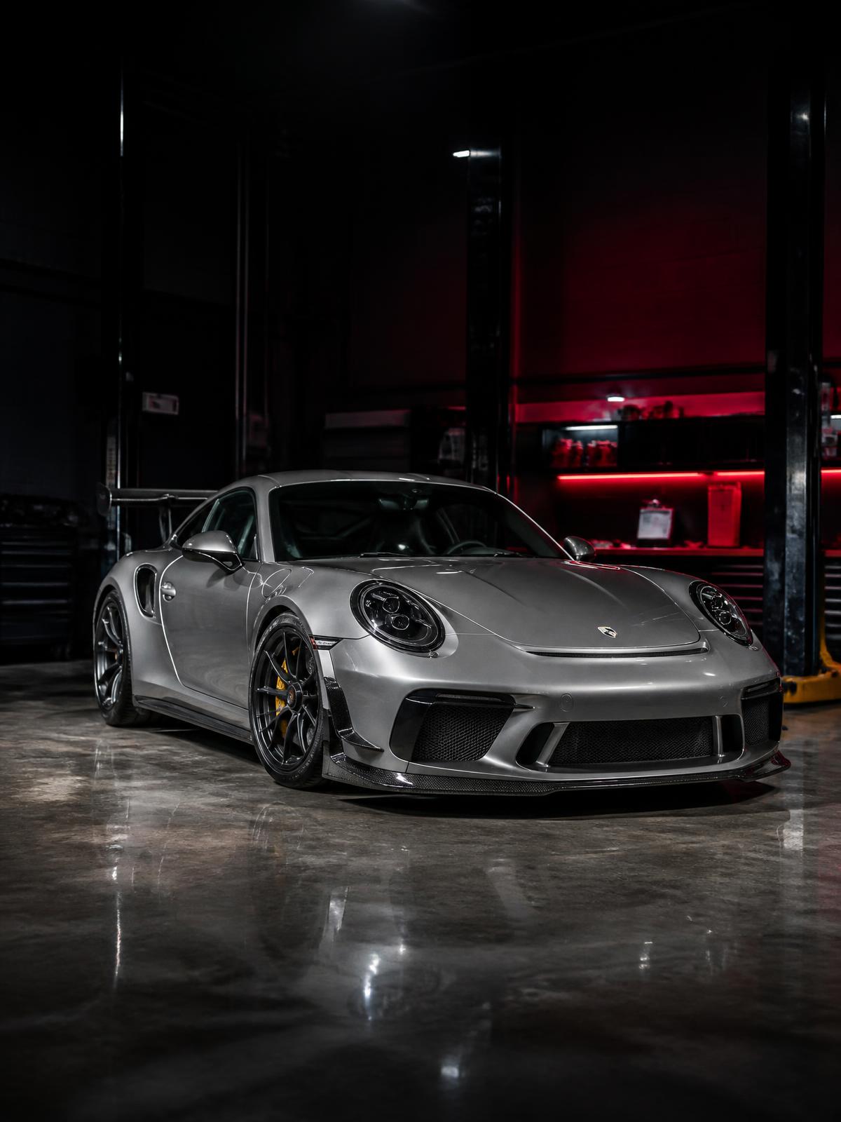 Matte black GT-R in tuning garage